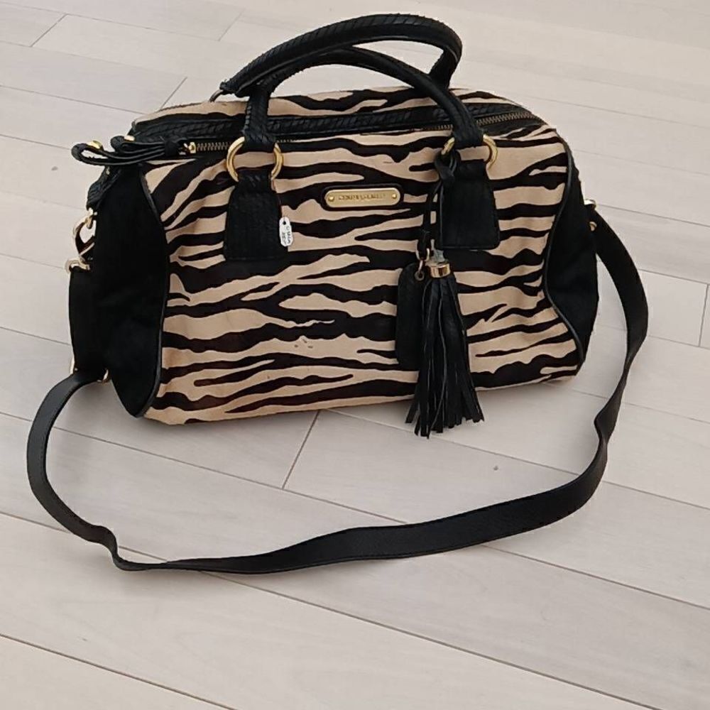 Cynthia Rowley Women's Zebra Striped Pattern Duffle Bag Tan and Black
